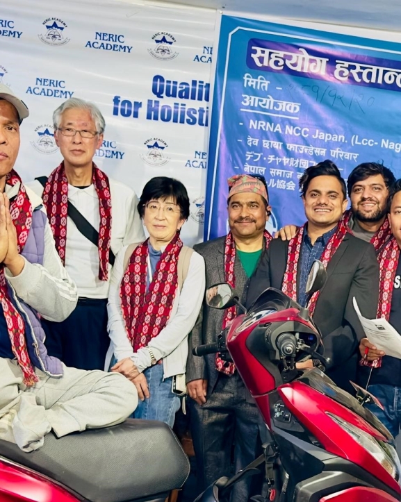 अशक्त थापालाई ह्वील चेयर स्कुटर